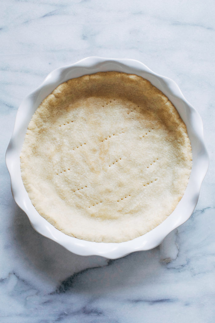 5-Ingredient Grain-free Vegan Pie Crust- all you need is one bowl and 10 minutes to make this delicious, buttery pie crust. No one will ever guess it's vegan and gluten-free!