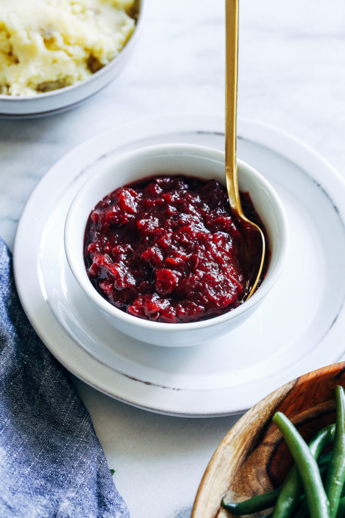 Easy Slow Cooker Cranberry Sauce- all you need is 3 simple ingredients (not including water) to make this easy homemade cranberry sauce that's so much better than store bought!