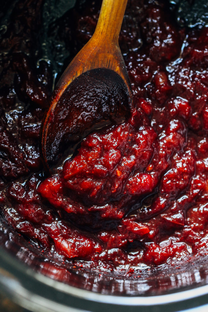 Easy Slow Cooker Cranberry Sauce- all you need is 3 simple ingredients (not including water) to make this easy homemade cranberry sauce that's so much better than store bought!