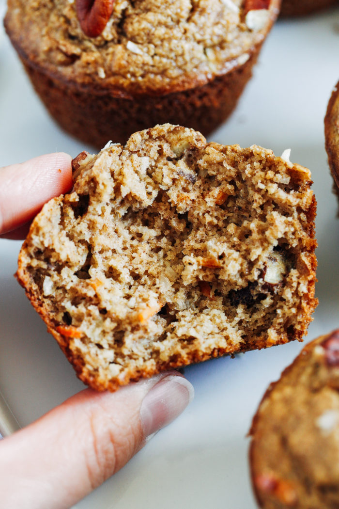 Healthy Flourless Morning Glory Muffins- packed full of healthy ingredients, these muffins make a perfect on-the-go breakfast or snack. They also happen to be gluten-free, oil-free, dairy-free, and refined sugar-free!