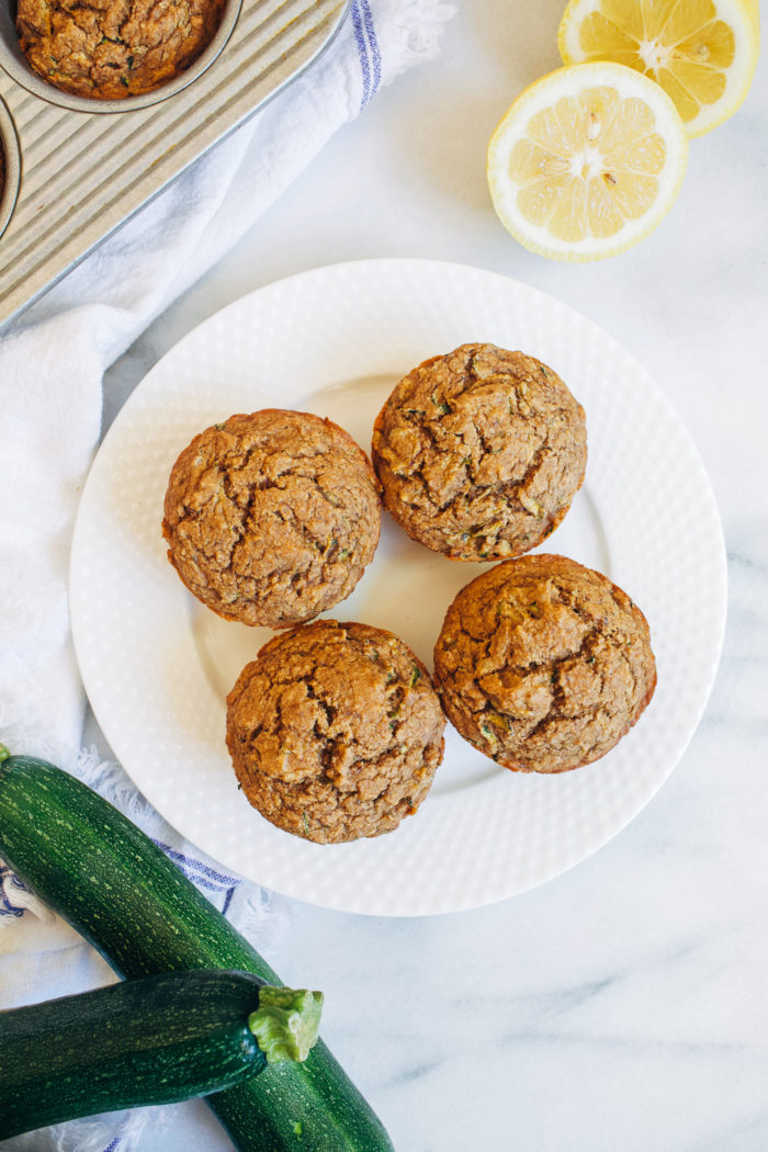 Vegan Lemon Zucchini Muffins- made with wholesome gluten-free flours, shredded zucchini and fresh lemon zest, these muffins are bursting with flavor and nutrition! 