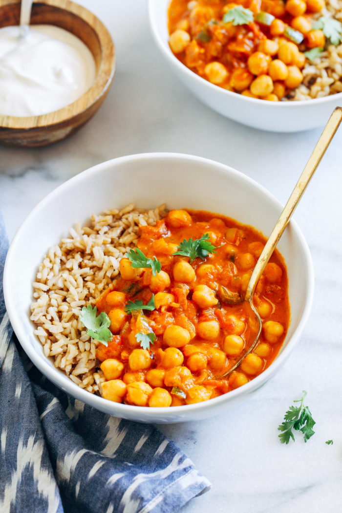 Quick and Easy Chana Masala- made with warm spices and creamy coconut milk, this comforting one-pot meal comes together in less than 30 minutes! (vegan + gluten-free with oil-free option)
