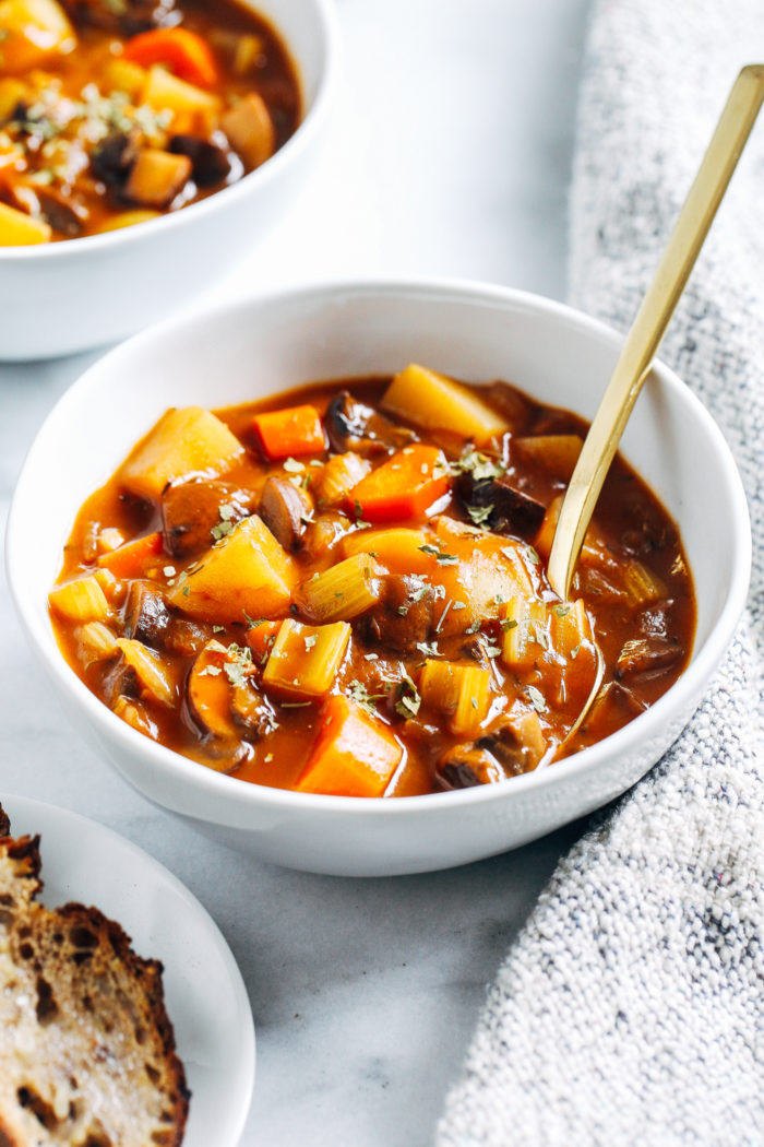 Vegan Mushroom Stew- made with hearty mushrooms and potatoes cooked in a savory broth, this meatless version of beef stew is sure to hit the spot on a cold winter day! 