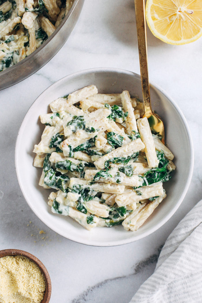 Lemon Cream Pasta with Spinach- made with a comforting dairy-free sauce, this creamy pasta is as easy as it is delicious. Less than 10 ingredients + 30 minutes to make!