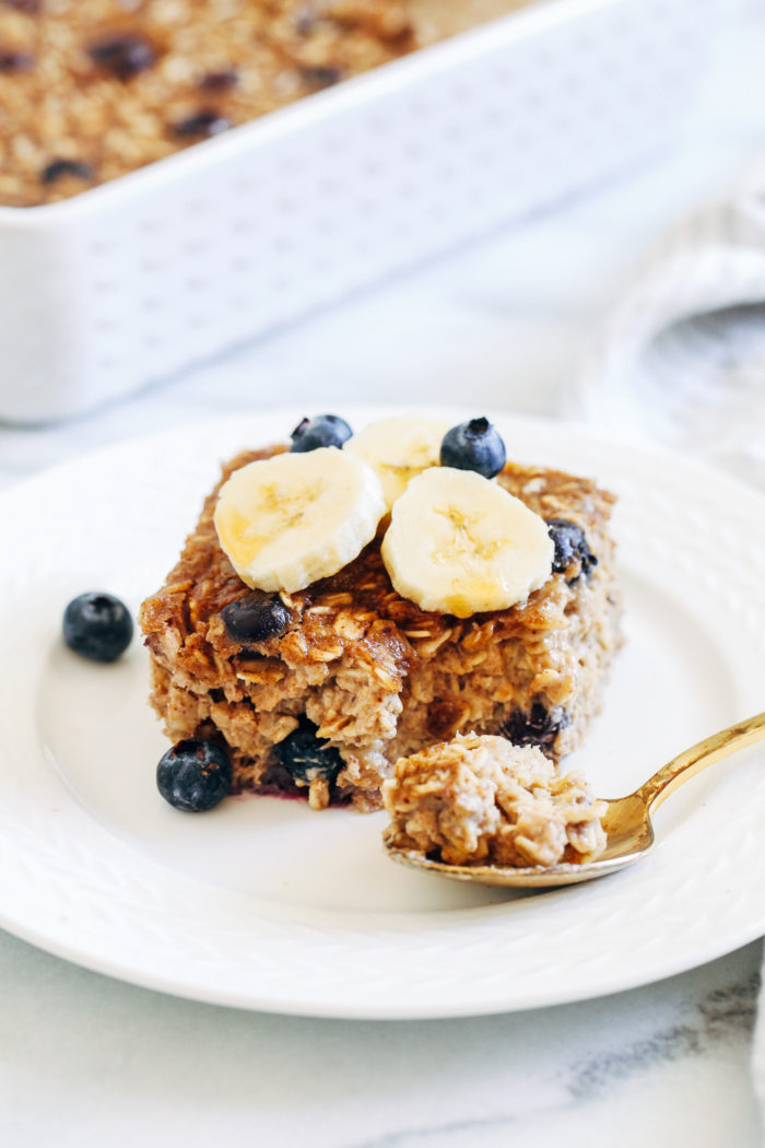Blueberry Banana Baked Oatmeal- this healthy make-ahead breakfast comes together fast and tastes just like banana bread. Each serving packs 10 grams of plant-based protein! (vegan + gluten-free)