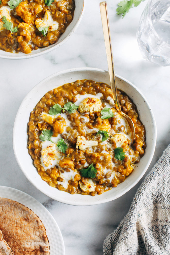 Roasted Butternut Squash and Lentil Curry- roasted butternut squash gives this hearty lentil curry delicious depth and texture. Easy to make and super satisfying, it's the perfect fall meal to cozy up with! (vegan + gluten-free)