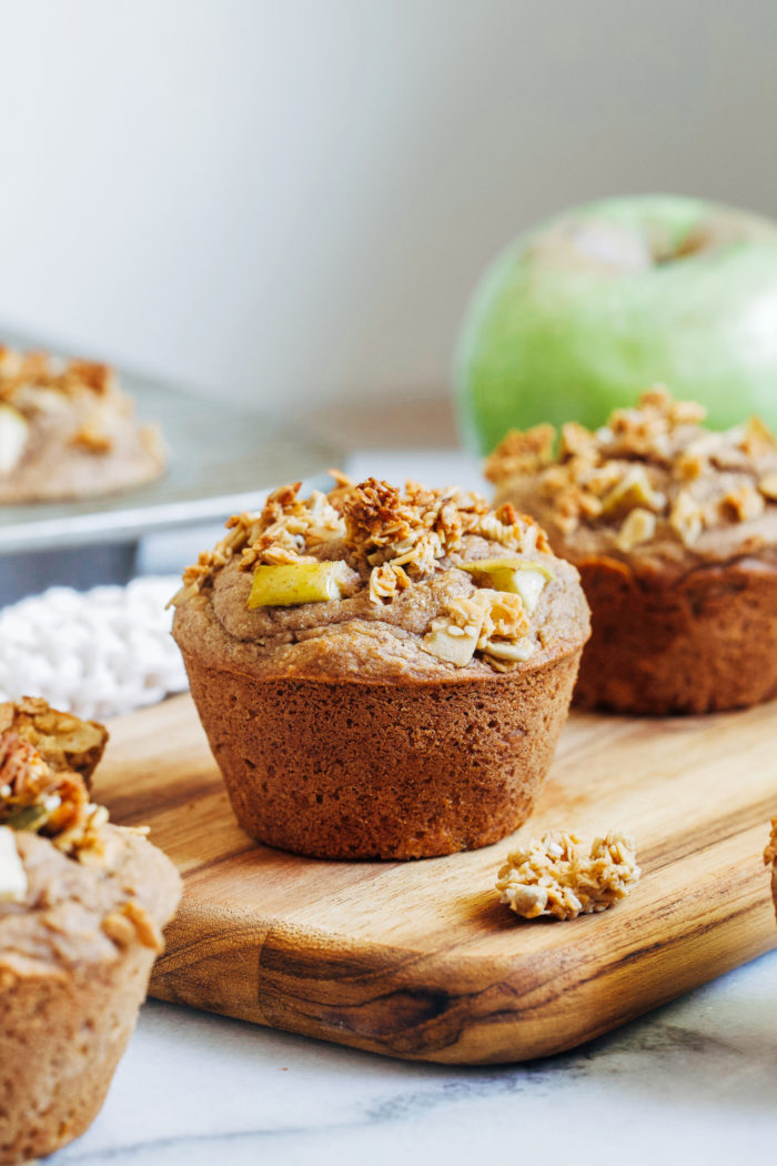 Vegan Gluten-free Apple Cinnamon Muffins- made with whole grain flour and naturally sweetened, these moist and nutritious muffins are the perfect treat to bake on a chilly fall weekend!