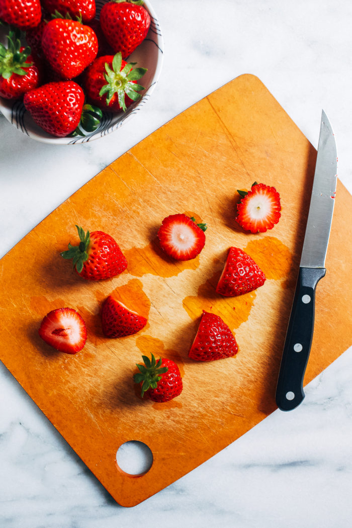 Perfect Strawberry Cake- fresh strawberries are tucked inside of buttery vanilla cake batter and baked to golden perfection. So simple to make and perfect for summertime!  (gluten-free and dairy-free)