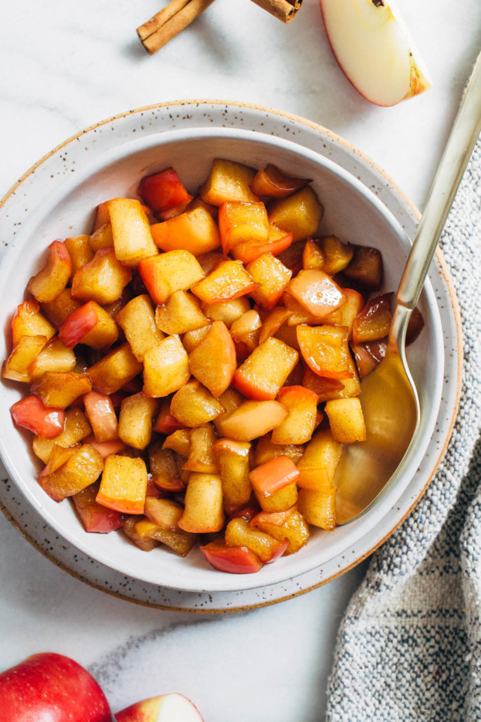 Easy Stovetop Cinnamon Apples- made with just 6 ingredients and in one skillet, these apples are the perfect topping for all of your breakfast favorites! (plant-based, gluten-free)