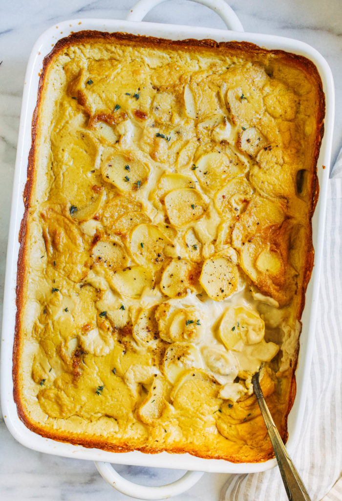 Easy Vegan Scalloped Potatoes- made with just 8 ingredients, this recipe for dairy-free scalloped potatoes is so much easier than the traditional version yet just as creamy and delicious! 