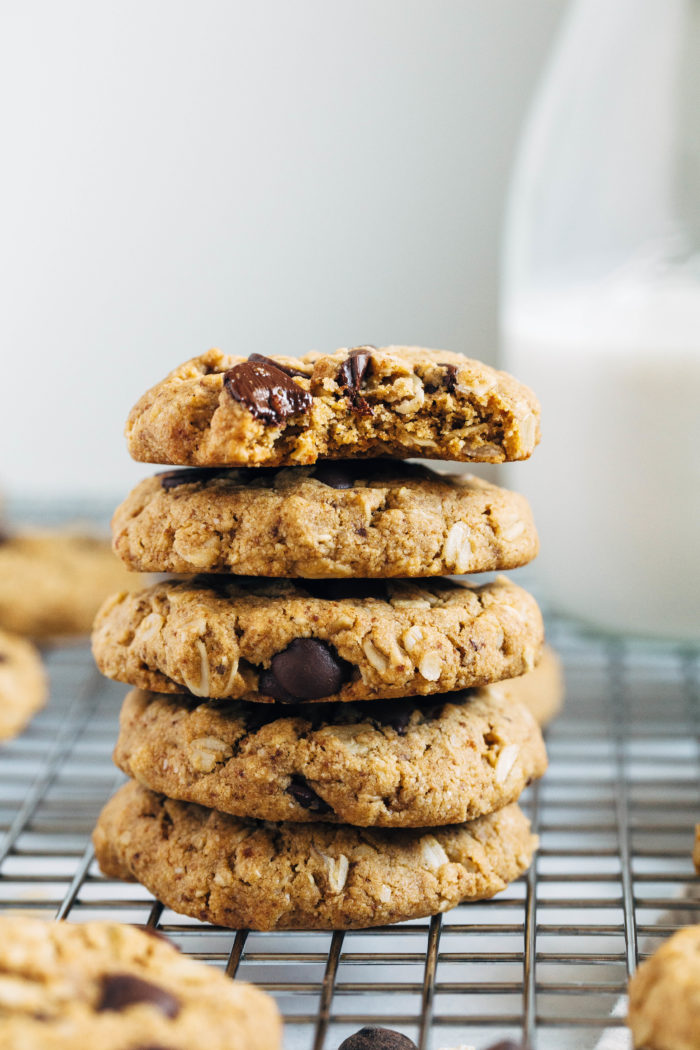 Vegan Oatmeal Chocolate Chip Cookies- made in one bowl, these chewy cookies have crisp edges and a soft center. No one would ever guess they are vegan and gluten-free!