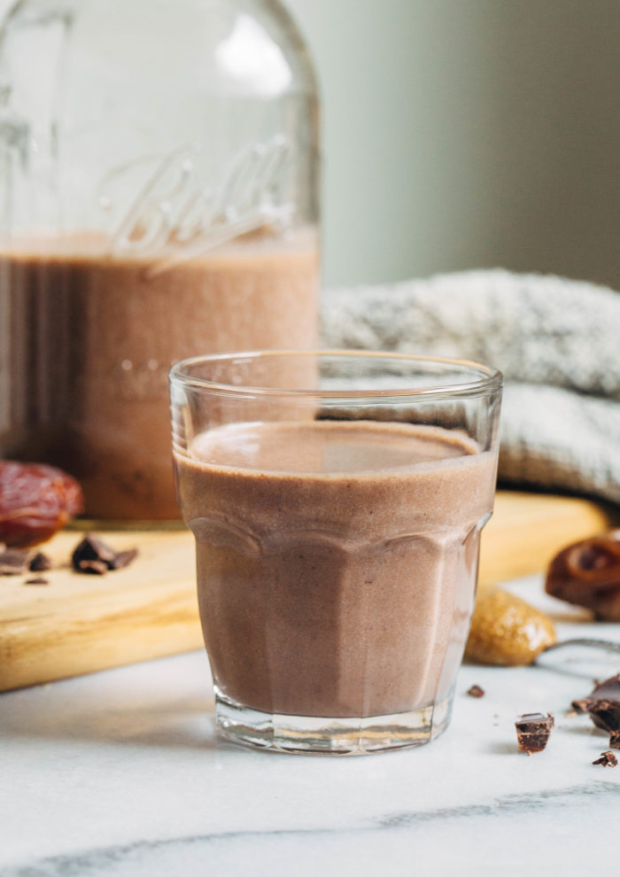Healthy Chocolate Milk Recipe- made with just 4 pantry ingredients, this homemade chocolate milk is a great source of nutrients like protein, iron, calcium and fiber! (vegan, gluten-free + nut-free option)