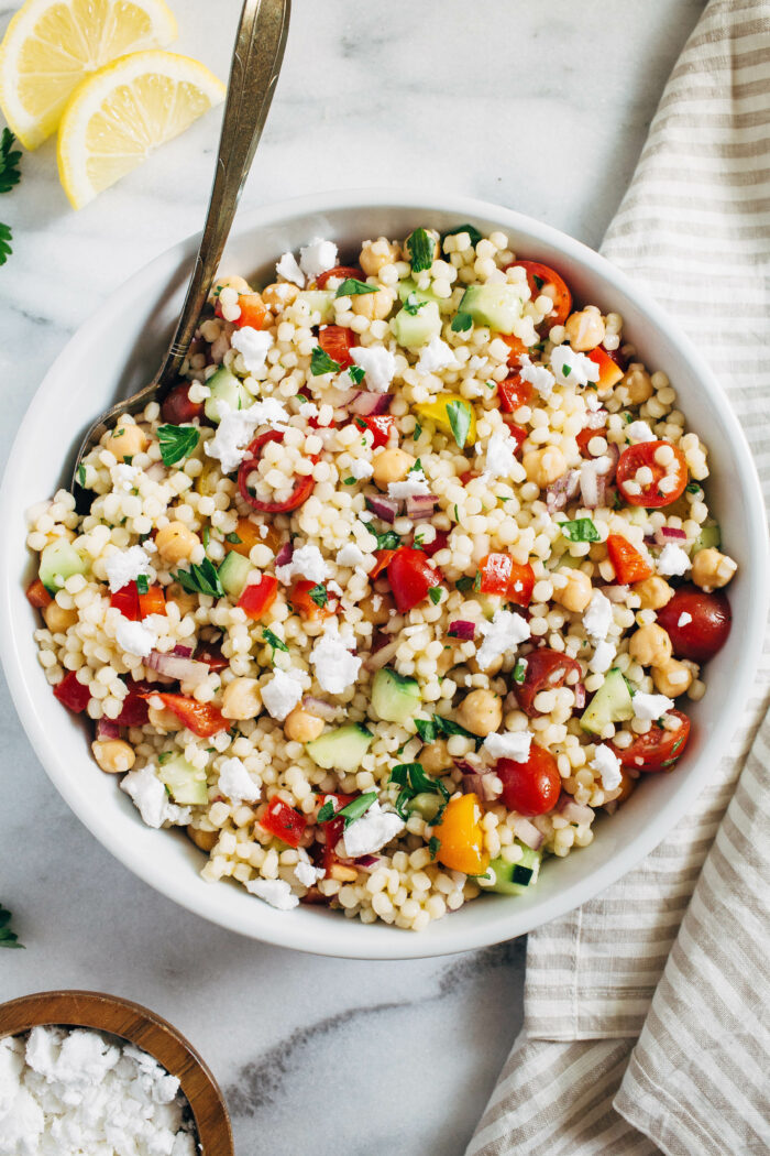 Mediterranean Couscous Salad- Made with fresh summer produce, this plant-based salad is light, satiating, and only takes 30 minutes to prepare! (vegan with gluten-free option)