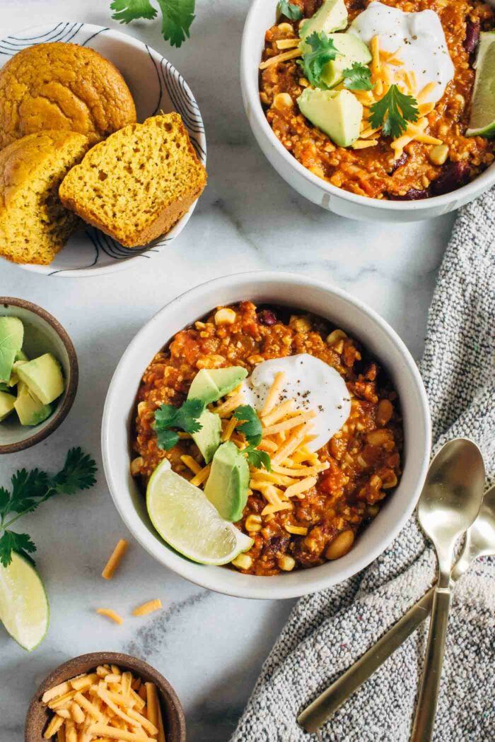 The Best Tempeh Chili- this hearty and wholesome chili is the best comfort food for a chilly fall evening. Packed with flavor and texture, each bowl serves up 20g of plant-based protein!