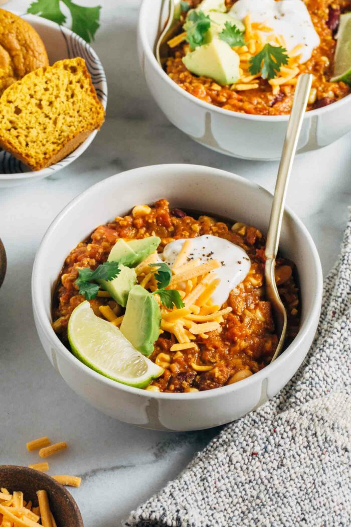 The Best Tempeh Chili- this hearty and wholesome chili is the best comfort food for a chilly fall evening. Packed with flavor and texture, each bowl serves up 20g of plant-based protein!