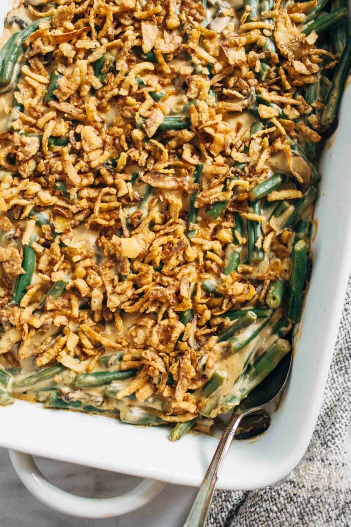 The Best Vegan Green Bean Casserole- made with a rich and creamy sauce that is secretly dairy-free, no one would this green bean casserole is actually plant-based! 