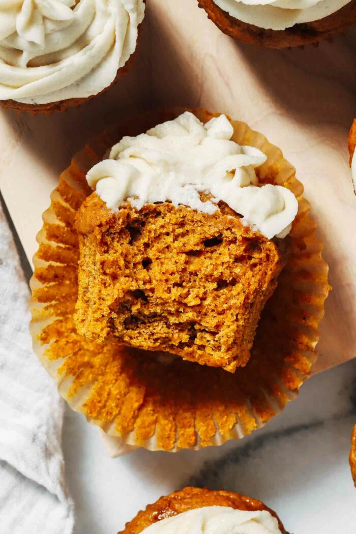 Vegan Pumpkin Cupcakes- moist and fluffy pumpkin cupcakes topped with a vegan cream cheese frosting. Perfect for fall baking! (refined sugar-free + gluten-free option)
