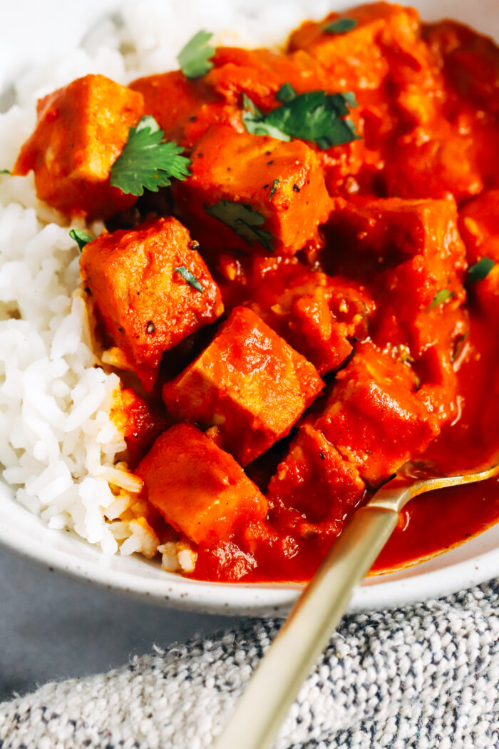 Vegan Butter Tofu- made with a creamy tomato sauce and baked tofu, this comforting meal provides 23g of complete protein per serving! (gluten-free)