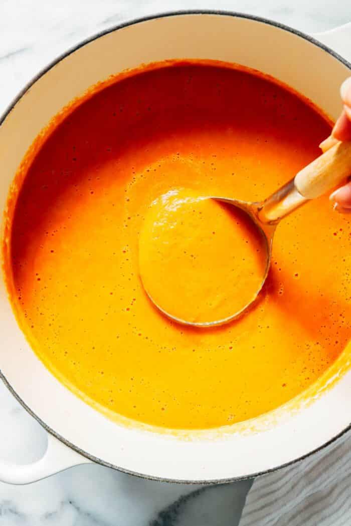 Vegan Red Lentil Tomato Soup- Cozy and full of flavor, this lentil soup is simple and easy to make. Each serving packs 11g of protein! 