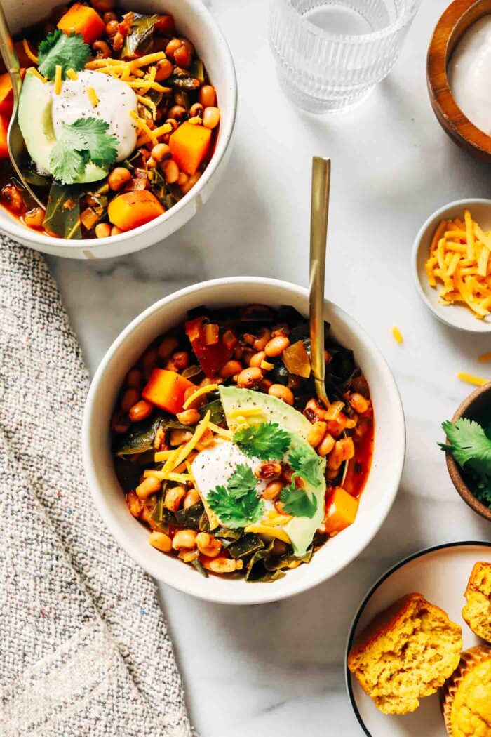 Black Eyed Pea Sweet Potato Chili- made in one-pot, this hearty plant-based chili is the perfect way to get your peas and greens for the New Year! (vegan, gluten-free)