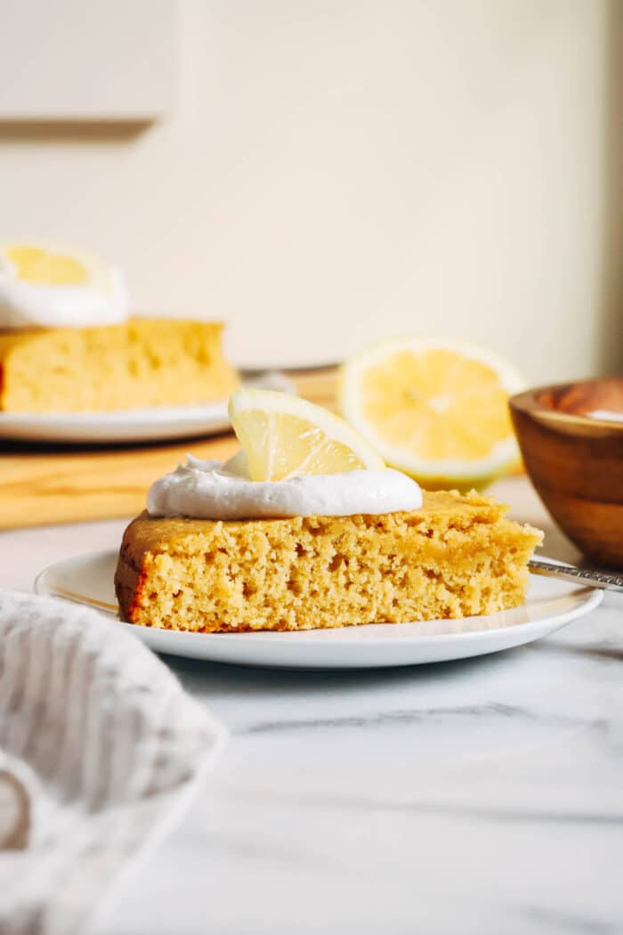 Lemon Olive Oil Cake- Made with fiber-rich almond flour and naturally sweetened with honey, this gluten-free and dairy-free lemon cake comes together easy in one bowl!
