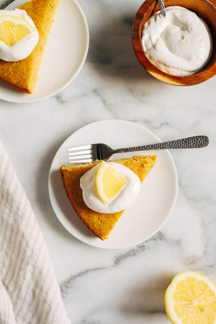 Lemon Olive Oil Cake- Made with fiber-rich almond flour and naturally sweetened with honey, this gluten-free and dairy-free lemon comes together easy in one bowl!