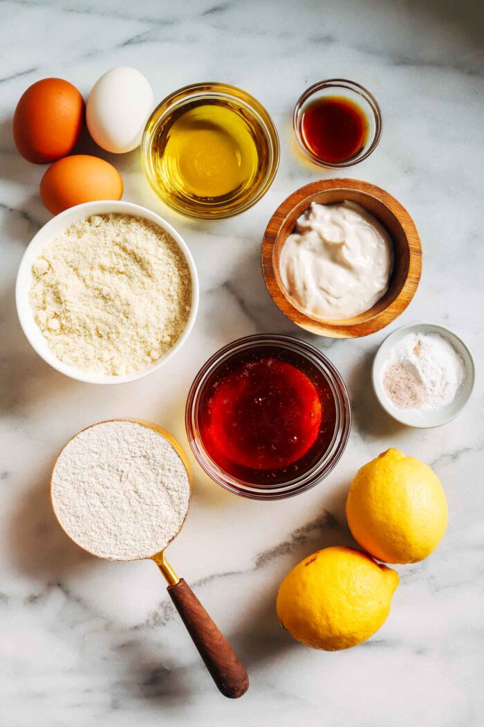 Lemon Olive Oil Cake- Made with fiber-rich almond flour and naturally sweetened with honey, this gluten-free and dairy-free lemon comes together easy in one bowl!