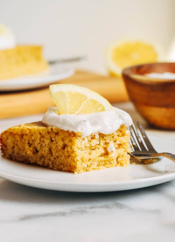 Lemon Olive Oil Cake- Made with fiber-rich almond flour and naturally sweetened with honey, this gluten-free and dairy-free lemon comes together easy in one bowl!