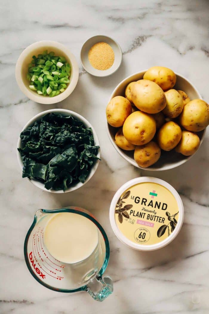 Vegan Colcannon- a plant-based take on an Irish classic featuring creamy mashed potatoes paired with sautéed kale and green onions. 