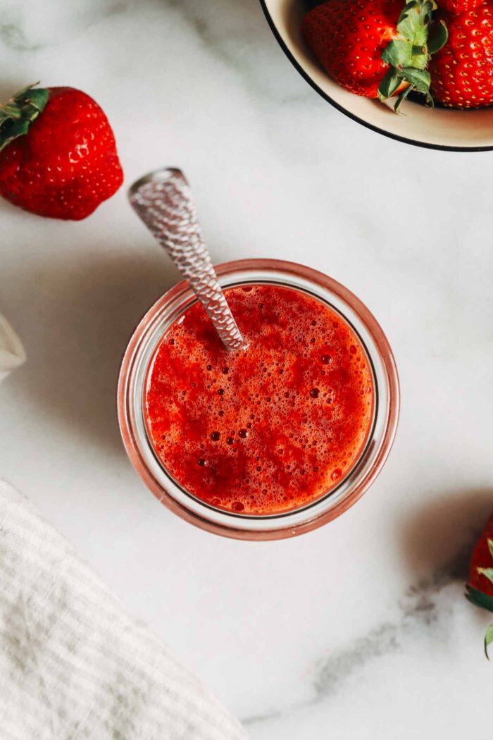 Made with just 3 ingredients, this strawberry syrup is naturally sweetened and refined sugar-free. Perfect for topping yogurt, oatmeal, pancakes, waffles, desserts and more! 