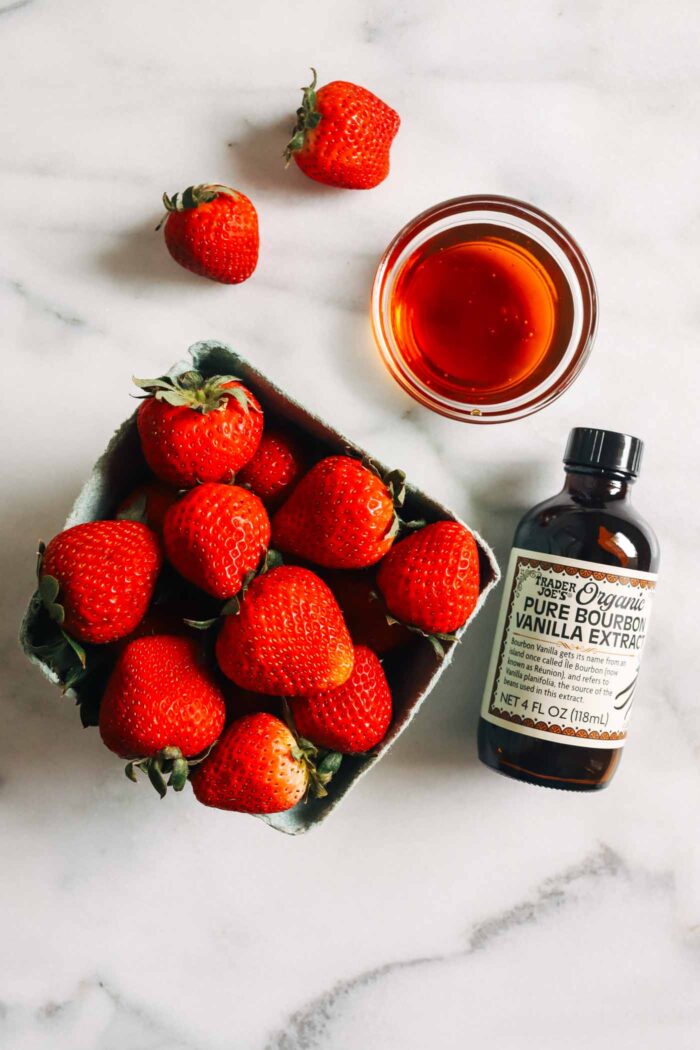 Made with just 3 ingredients, this strawberry syrup is naturally sweetened and refined sugar-free. Perfect for topping yogurt, oatmeal, pancakes, waffles, desserts and more! 