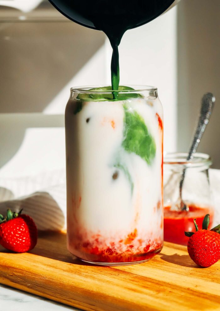 Naturally sweetened with strawberries and honey, this strawberry matcha latte is the perfect summertime drink! 