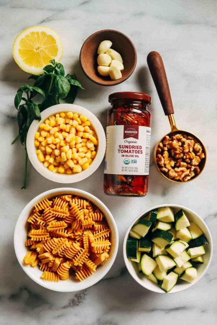 Ready in just 30 minutes, this sundried tomato pesto pasta is bursting with umami flavor. Perfect for a quick and easy summer dinner! (vegan + gluten-free)