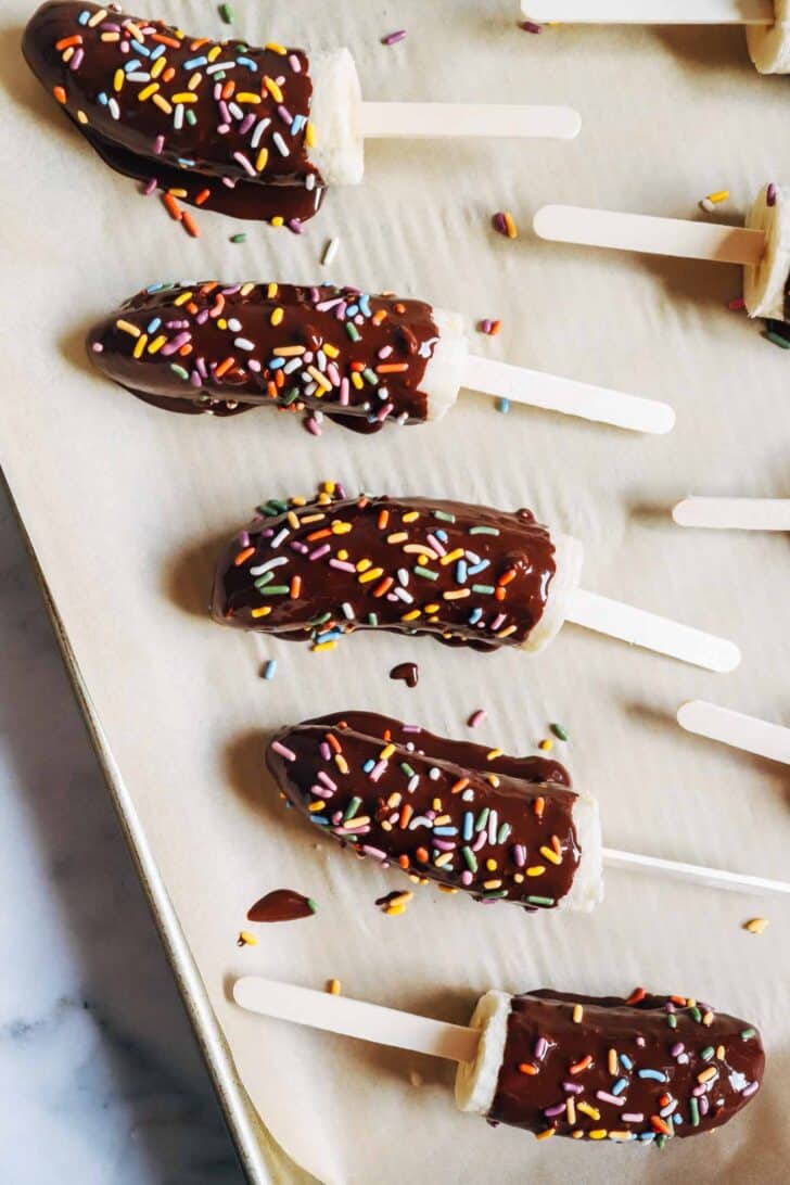 You only need 4 ingredients to make these refreshing banana popsicles! Perfect for a fun and refreshing dessert that's nutritious too. (vegan, gluten-free, and nut-free option)