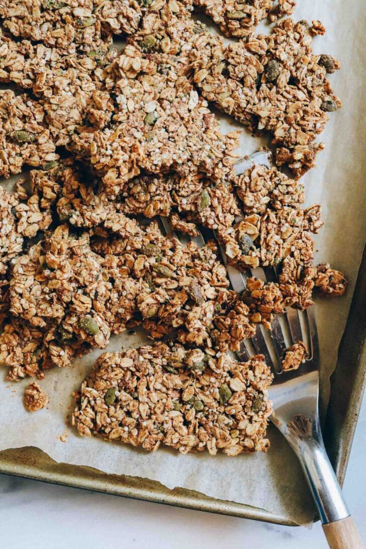 Made in one-bowl with simple pantry ingredients, each serving of this granola packs 7 grams of protein! (vegan + gluten-free)