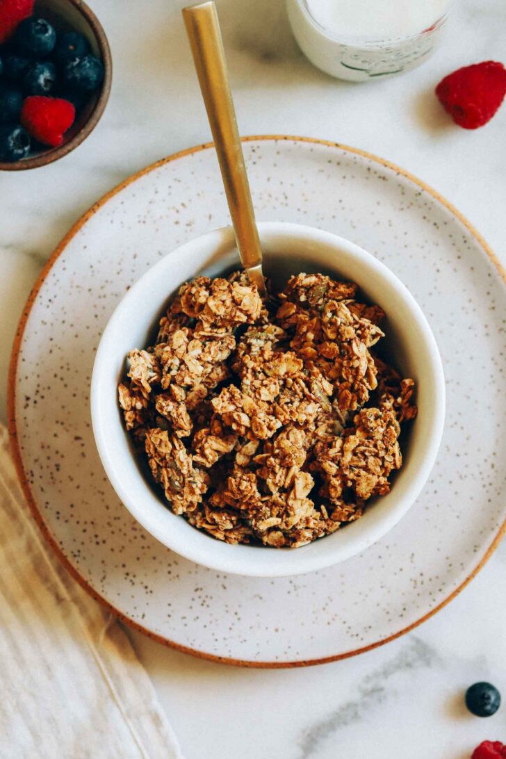 Made in one-bowl with simple pantry ingredients, each serving of this granola packs 7 grams of protein! (vegan + gluten-free)