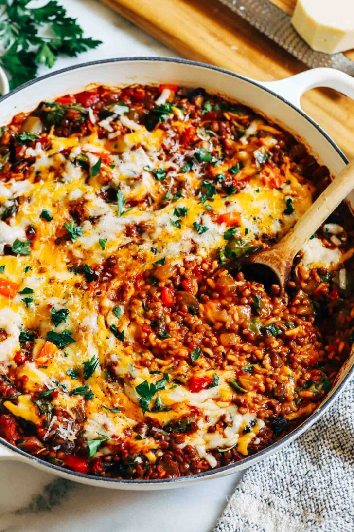 Lentil Stuffed Pepper Skillet- Made in one-pot, this vegan version of a stuffed pepper skillet is easy to prep and packs 23 grams of protein and 21 grams of fiber per serving!